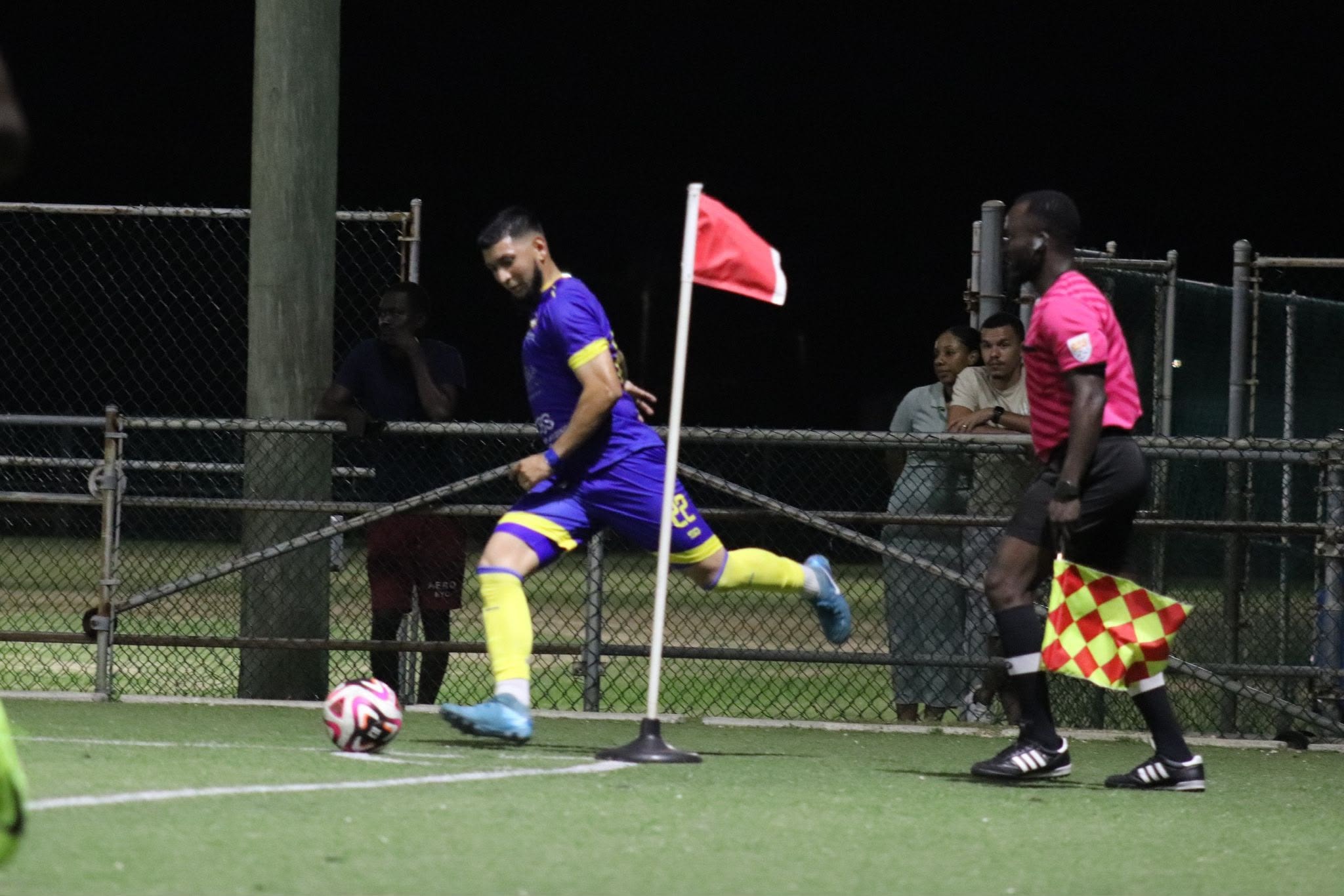 Scholars International players sharing a moment on the football field